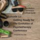 Photo ID: Photo ID: a wooden tabletop with a map, sunglasses, a camera, a thermos, some paracord, and a leather and canvas bag with text overlay "Episode 11: Getting Ready for The Evolution of Psychotherapy Conference"