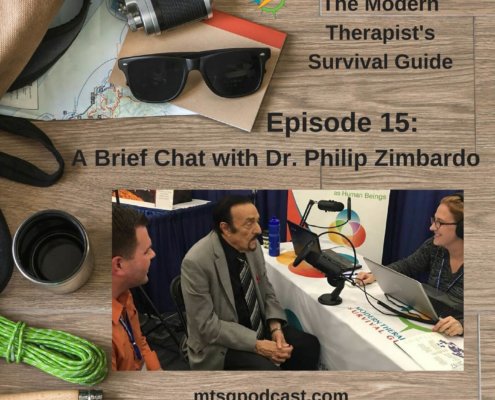 Photo ID: a wooden tabletop with a map, sunglasses, a camera, a thermos, some paracord, and a leather and canvas bag with a picture of Curt and Katie chatting with Dr. Zimbardo and text overlay "Episode 15: A Brief Chat with Dr. Philip Zimbardo"