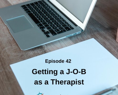 Photo ID: A wooden desk with a laptop, a sheet of paper, and a pen on it with text overlay "Episode 42: Getting a J-O-B as a Therapist"