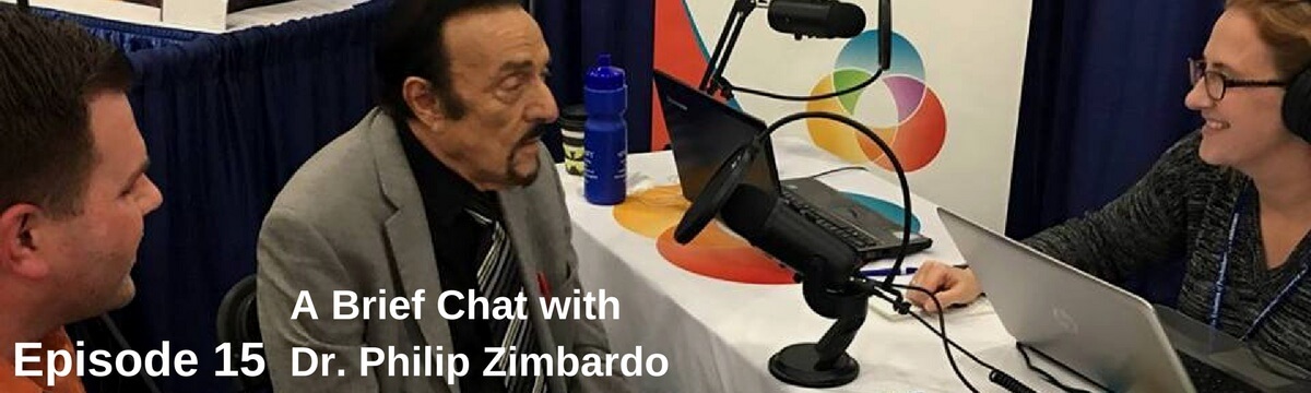 Photo ID: A picture of Curt and Katie chatting with Dr. Phillip Zimbardo with text overlay 